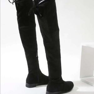 Knee high boots (never worn just for the picture)